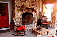 Cabin with outdoor stone fireplace